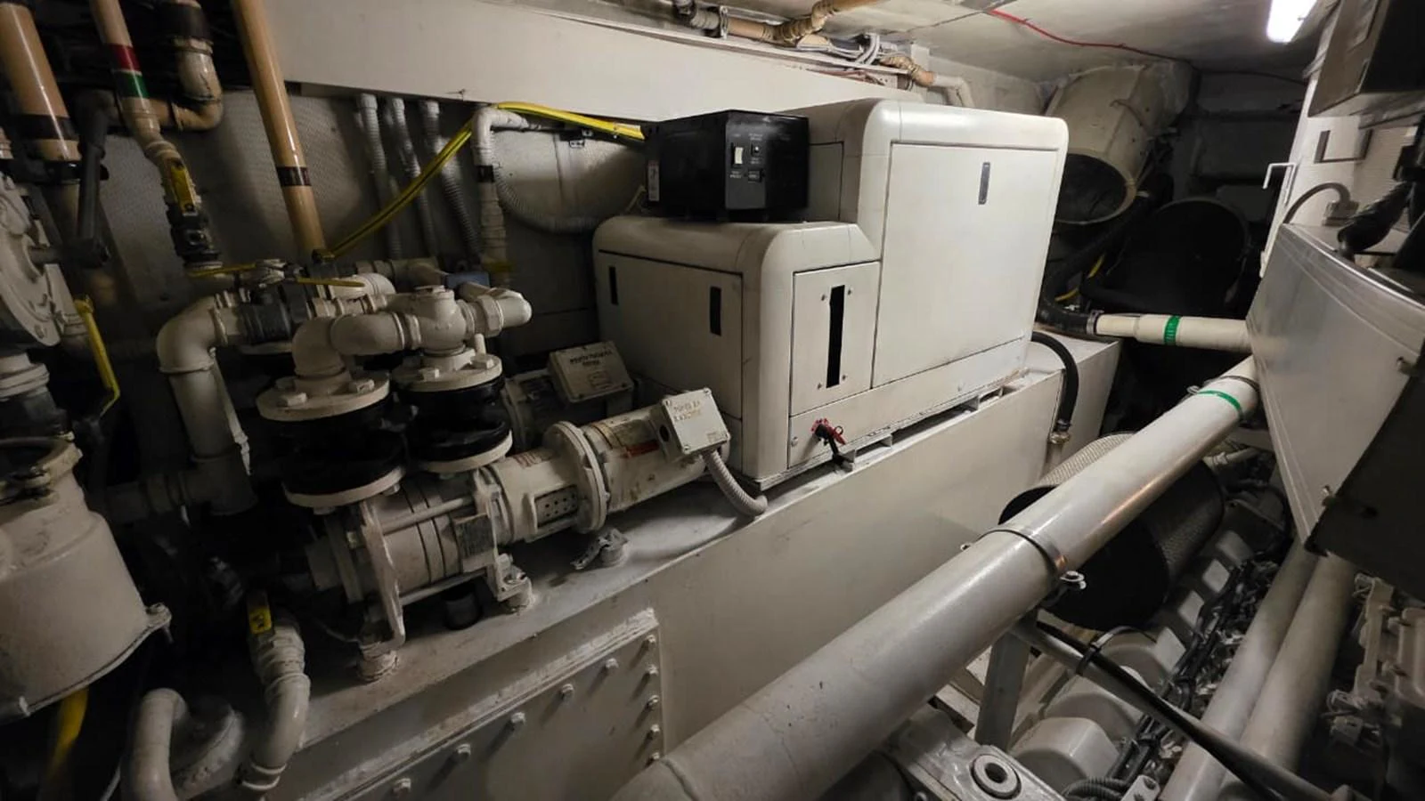 The image showcases the yacht's engine room with various mechanical components and systems. aboard AMAR T Yacht for Sale