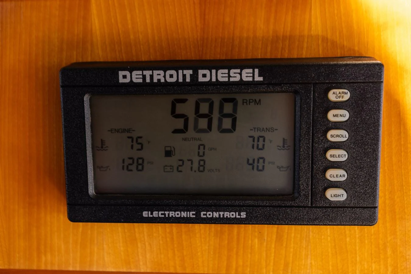 A close-up view of the Detroit Diesel electronic controls display on a yacht. aboard DAWN TRADER VII Yacht for Sale