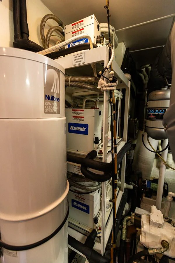 The image showcases the technical and mechanical equipment in the yacht's engine room. aboard DAWN TRADER VII Yacht for Sale