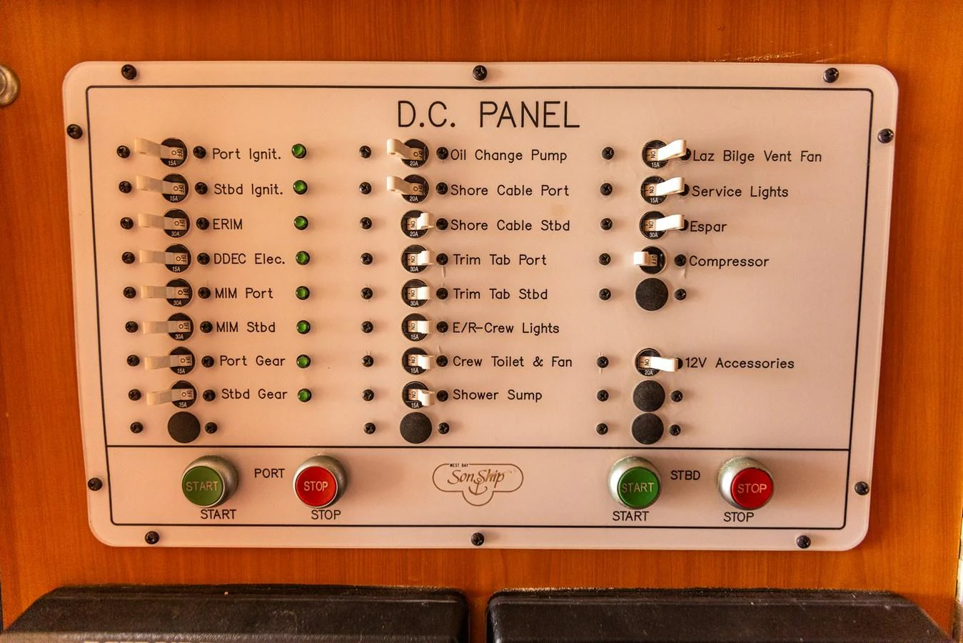 The image showcases a detailed view of the yacht's D.C. panel with various control switches and indicators. aboard DAWN TRADER VII Yacht for Sale