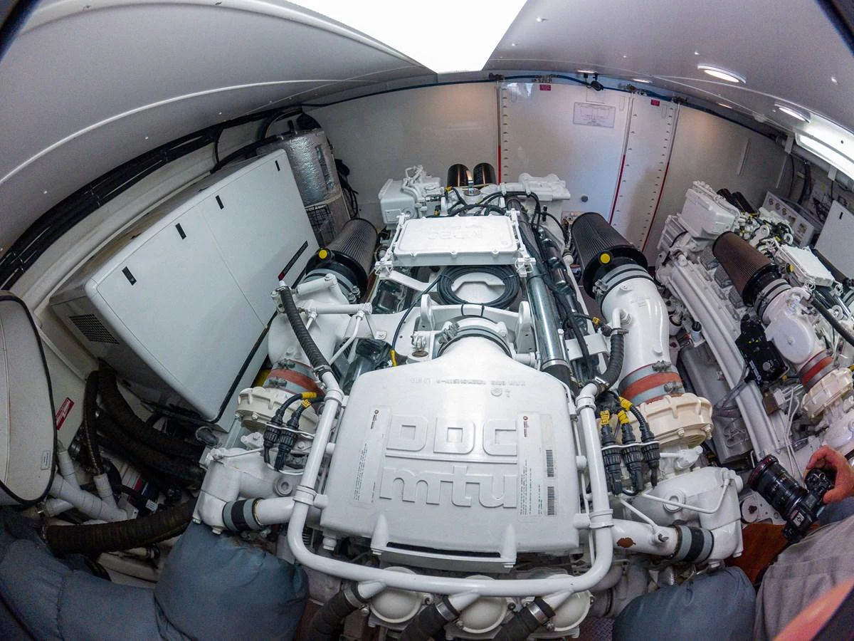 The engine room showcases powerful machinery and a well-organized layout. aboard DAWN TRADER VII Yacht for Sale