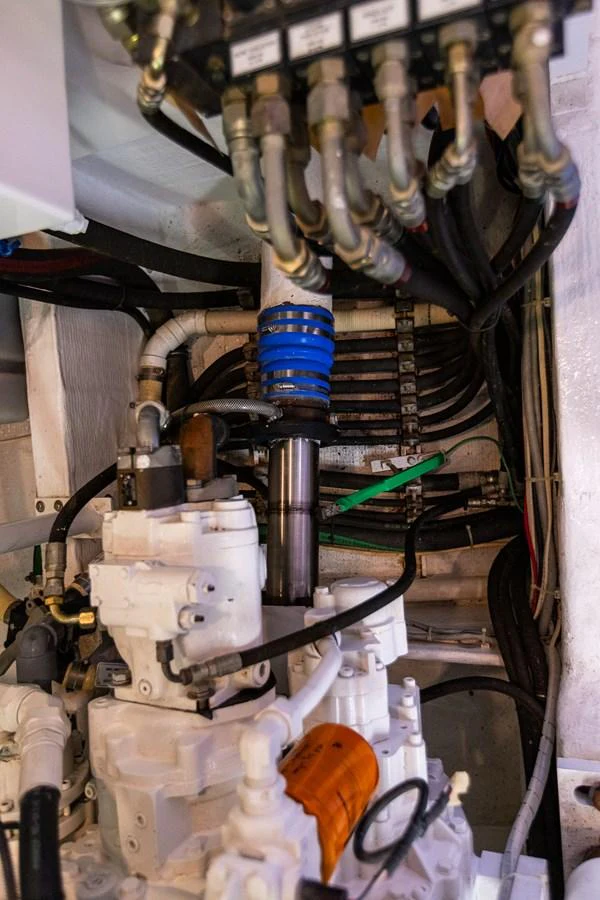 A detailed view of the yacht's engine room showcasing its mechanical components. aboard DAWN TRADER VII Yacht for Sale