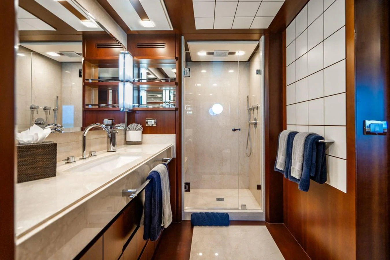 The yacht's bathroom features a spacious shower and elegant fixtures, creating a luxurious and comfortable environment. aboard BEAUTIFUL M Yacht for Sale