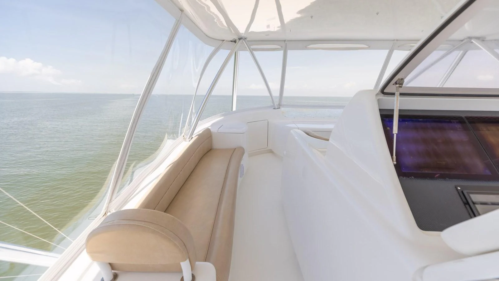 The flybridge offers a serene and spacious area with panoramic views of the sea. aboard CE Yacht for Sale