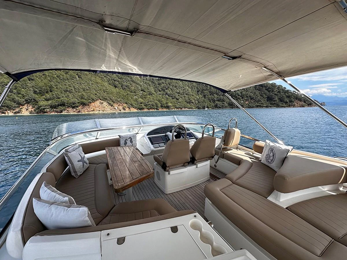 The flybridge offers a spacious seating area with panoramic views of the surrounding waters. aboard SEDEF Yacht for Sale