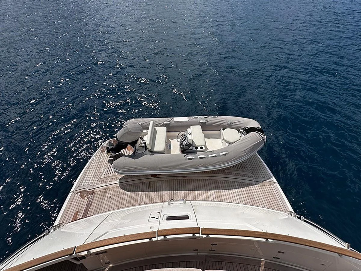 A sleek tender is secured on the yacht's swim platform, ready for adventure. aboard SEDEF Yacht for Sale