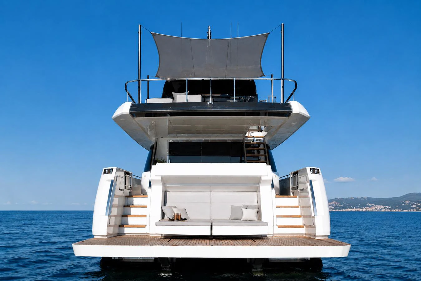 The yacht's aft deck offers a spacious and inviting area for relaxation and socializing, with comfortable seating and a stunning view of the sea. aboard LD Yacht for Sale