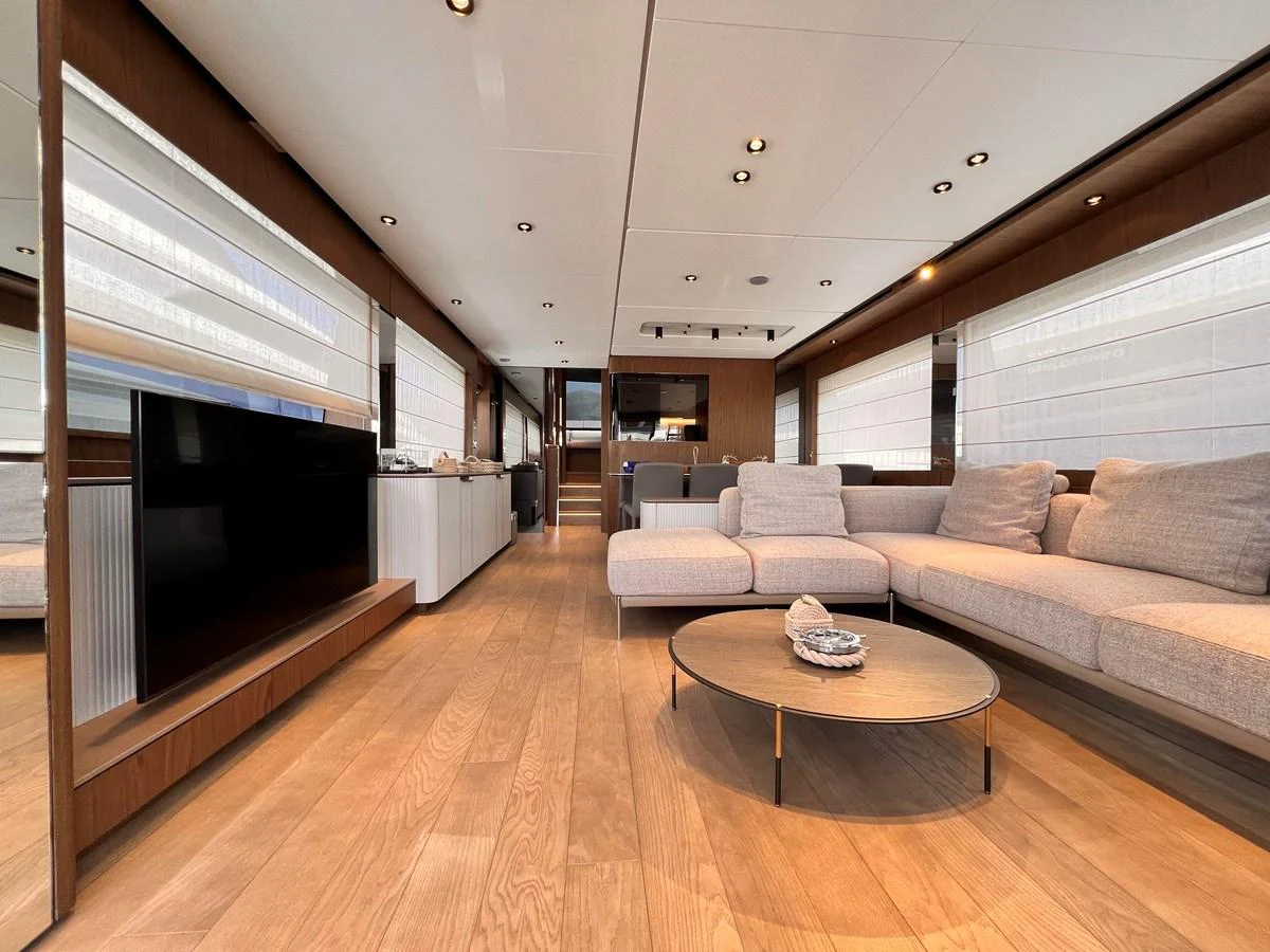 The salon features a spacious and modern design with comfortable seating and elegant decor. aboard LD Yacht for Sale