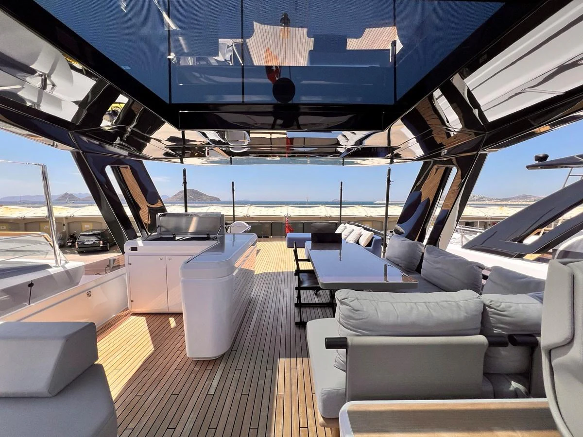 The sundeck offers a luxurious open-air lounging and dining area with panoramic views. aboard LD Yacht for Sale
