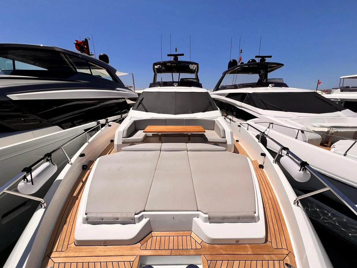 The yacht's foredeck features a spacious sunbathing area with plush cushions and teak decking. aboard LD Yacht for Sale