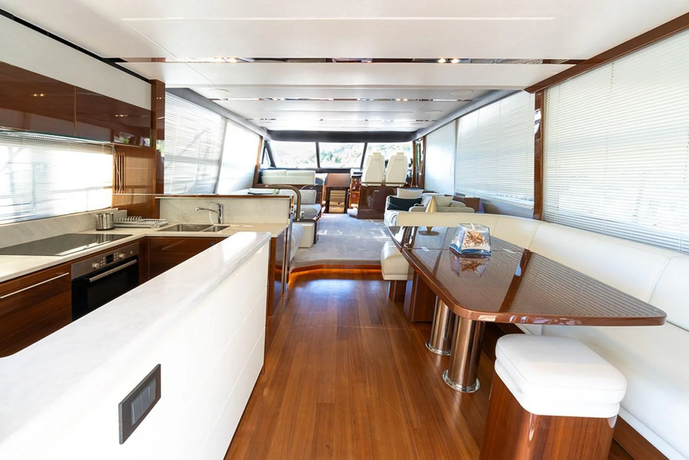 The yacht's salon features a spacious and elegant layout with modern furnishings and ample natural light. aboard DAPHNE Yacht for Sale