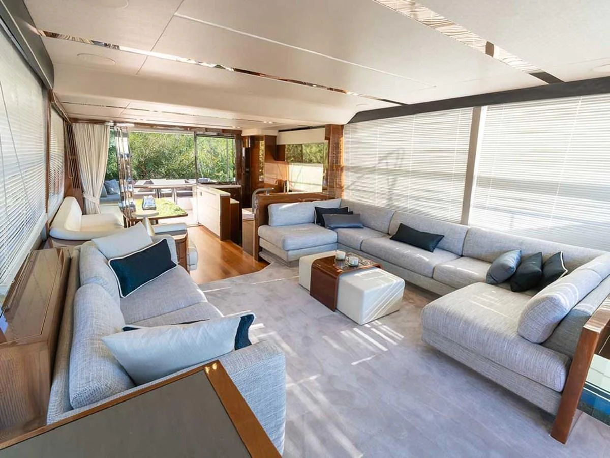 The spacious salon features plush seating and ample natural light, creating a welcoming and luxurious atmosphere. aboard DAPHNE Yacht for Sale