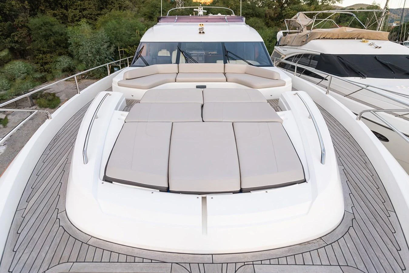 The foredeck of the yacht features spacious sun pads and comfortable seating, perfect for relaxation. aboard DAPHNE Yacht for Sale
