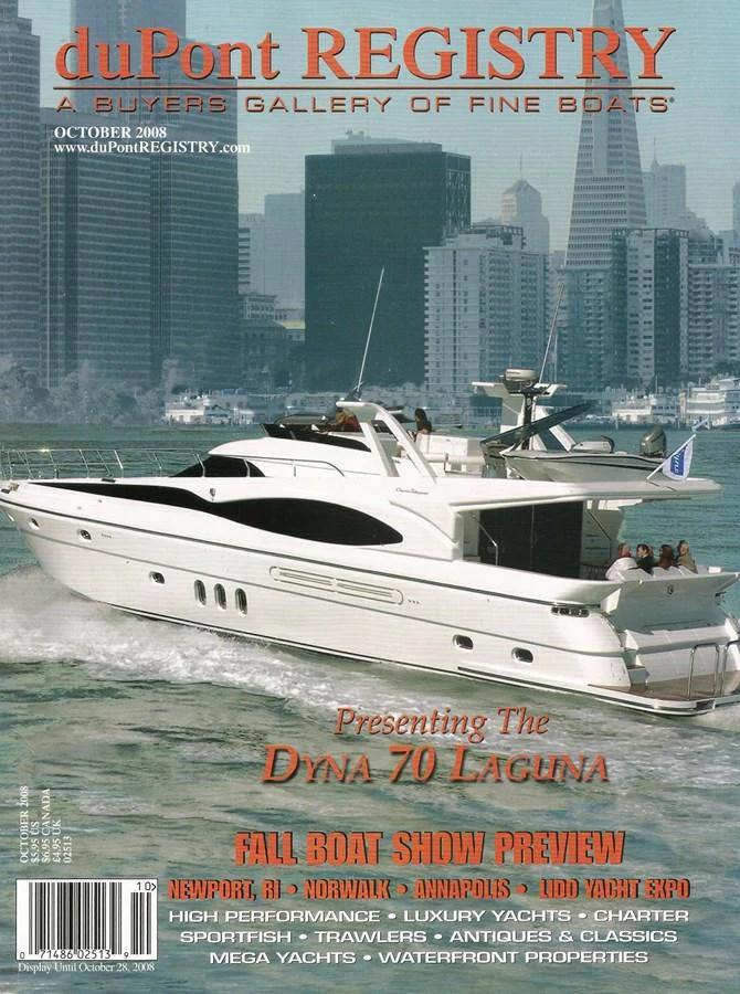 A sleek yacht cruises through a city harbor, showcasing its elegant design and spacious decks. aboard SHOW ME THE MONEY Yacht for Sale