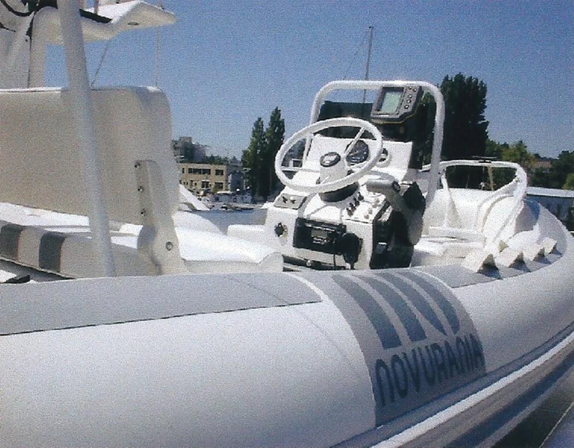 A sleek tender with a modern helm station, perfect for quick trips to shore. aboard SHOW ME THE MONEY Yacht for Sale