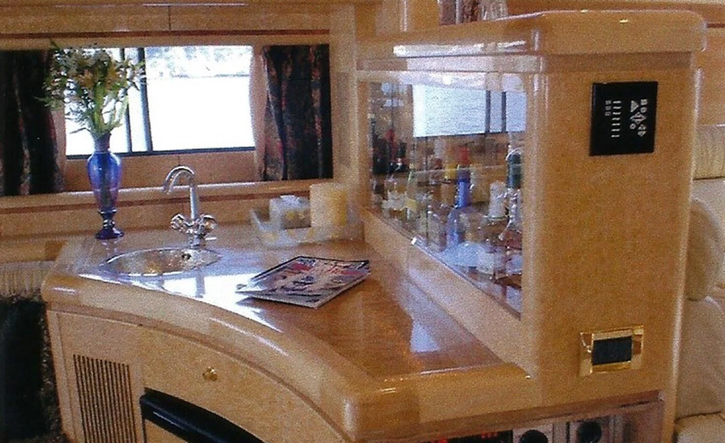 The yacht's galley features a sleek countertop with a sink and a variety of amenities for convenience. aboard SHOW ME THE MONEY Yacht for Sale