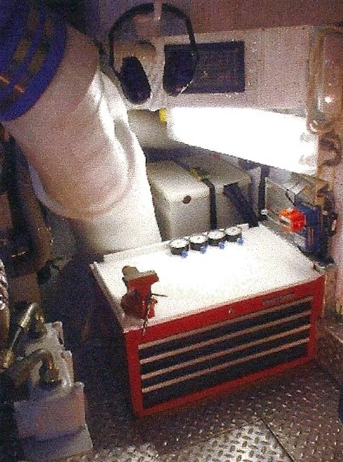 A well-organized engine room with essential tools and equipment neatly arranged. aboard SHOW ME THE MONEY Yacht for Sale