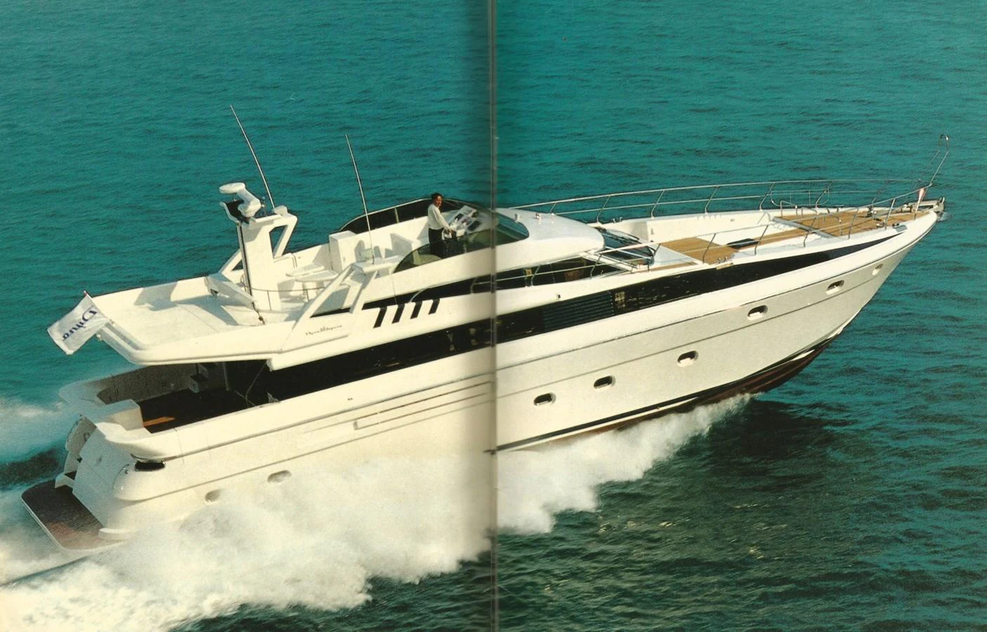 A sleek yacht cruises swiftly through the open water, showcasing its elegant design and powerful performance. aboard SHOW ME THE MONEY Yacht for Sale