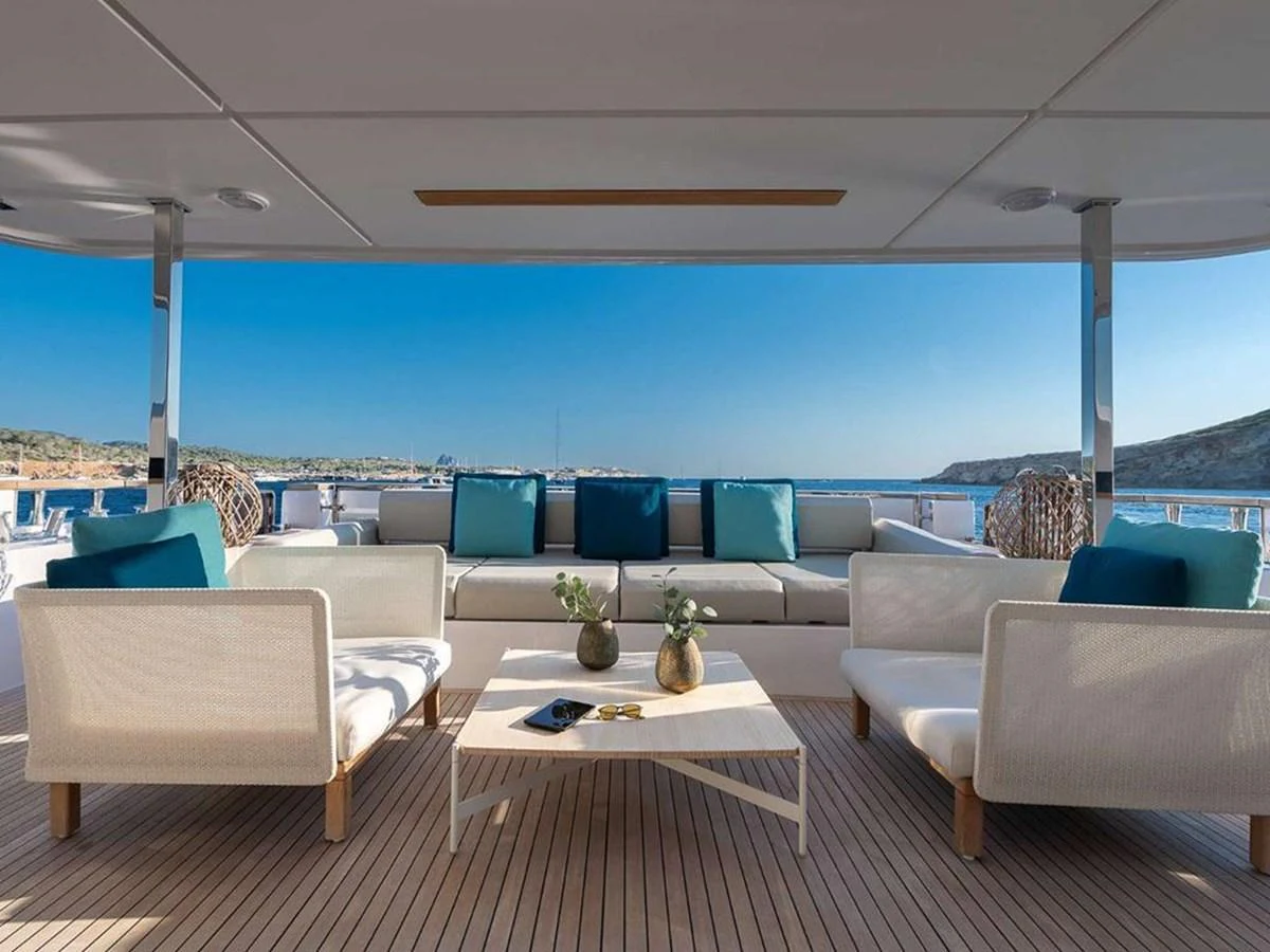 The aft deck offers a spacious and inviting seating area with a stunning view of the sea. aboard ON Yacht for Sale