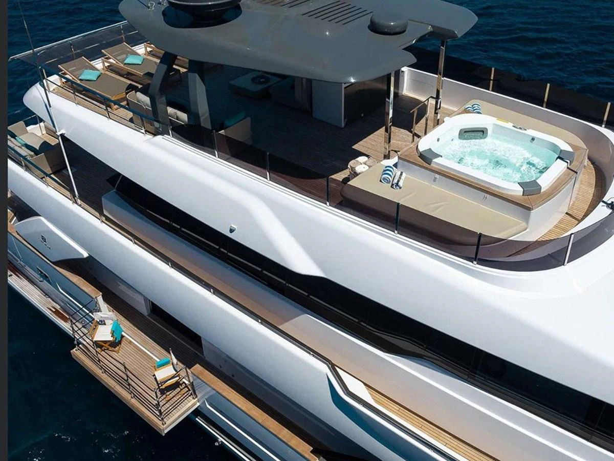 The yacht features a luxurious sundeck with a jacuzzi and ample lounging space, perfect for relaxation. aboard ON Yacht for Sale