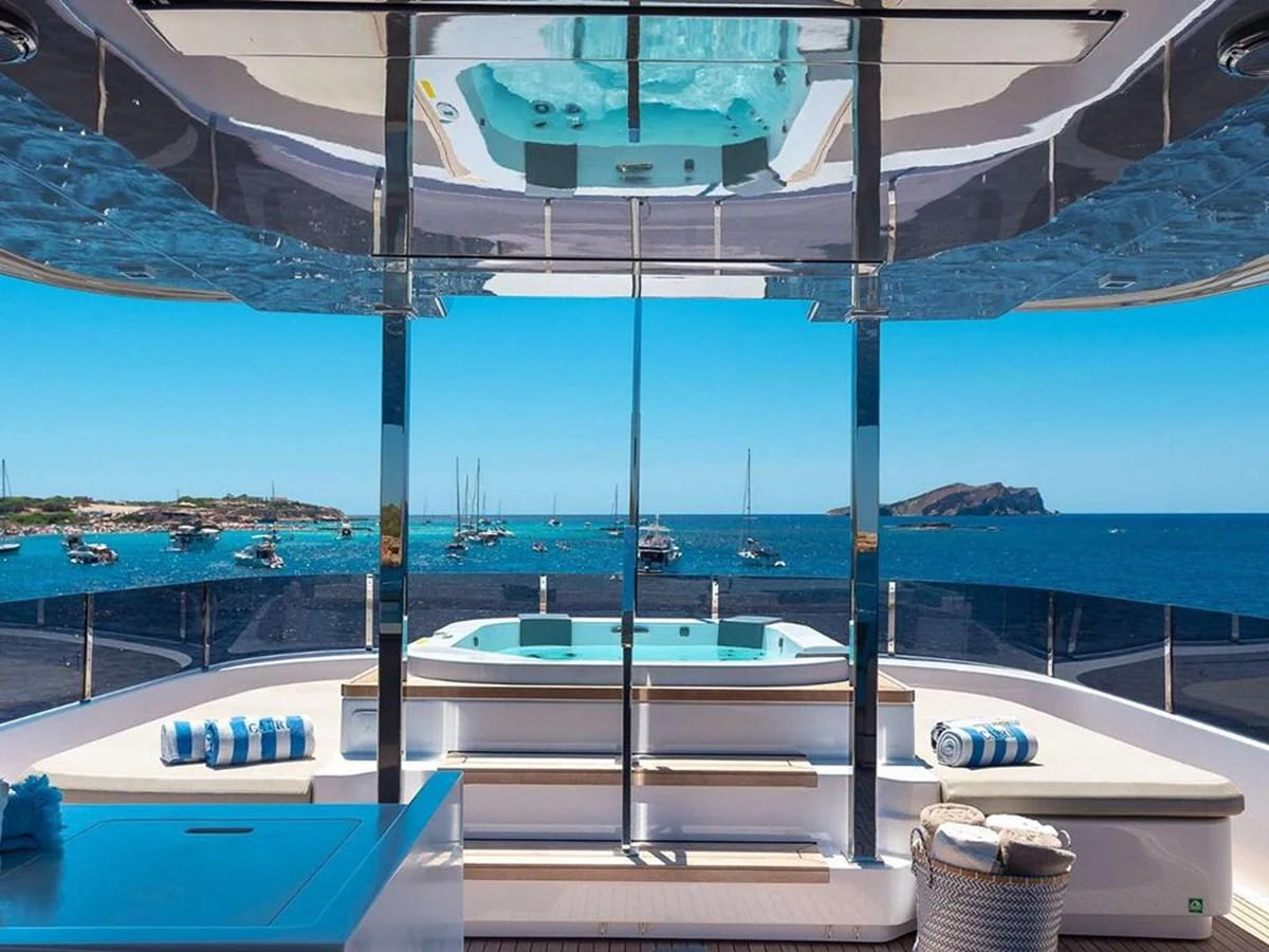 The sundeck features a luxurious jacuzzi with stunning ocean views. aboard ON Yacht for Sale