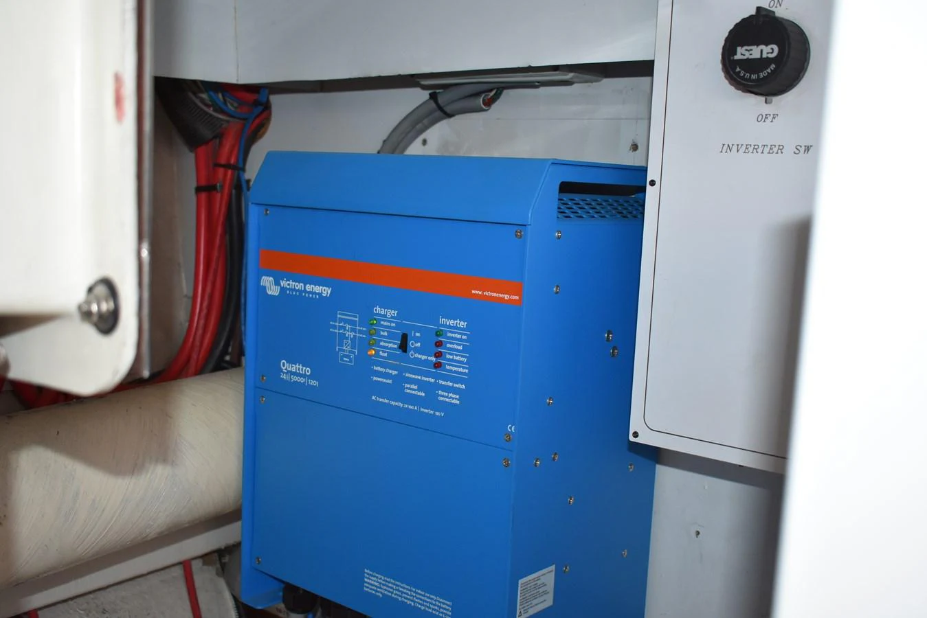 The image shows a close-up of the yacht's electrical system components. aboard 64 OCEAN ALEXANDER Yacht for Sale