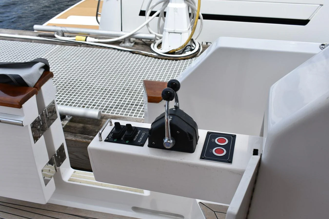 A close-up view of the yacht's control lever and surrounding area. aboard 64 OCEAN ALEXANDER Yacht for Sale