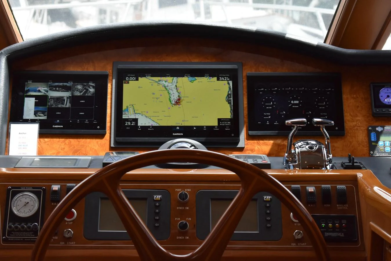 The helm features advanced navigation systems and controls for a seamless sailing experience. aboard 64 OCEAN ALEXANDER Yacht for Sale