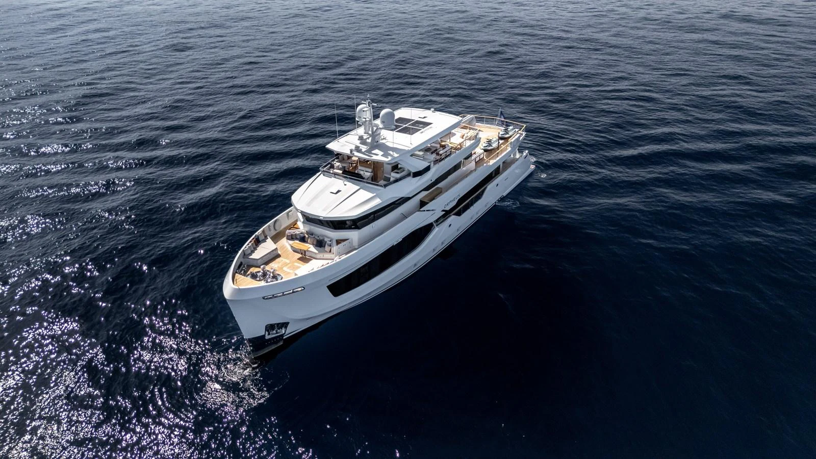 A sleek, modern yacht cruising gracefully on calm waters. aboard NUMARINE 37XP#22 Yacht for Sale