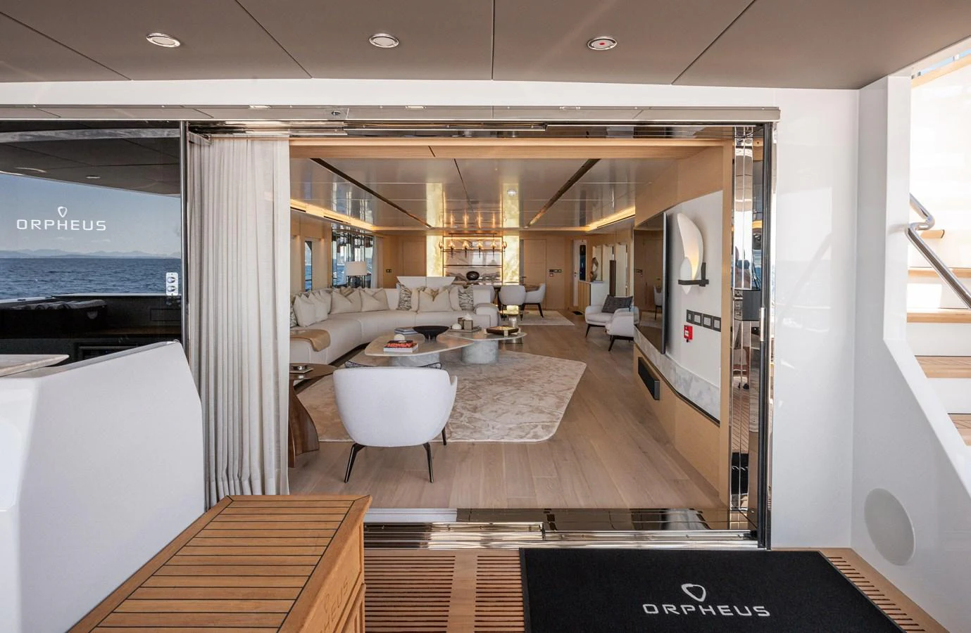 The luxurious salon features elegant seating and modern decor, offering a welcoming and sophisticated ambiance. aboard NUMARINE 37XP#22 Yacht for Sale