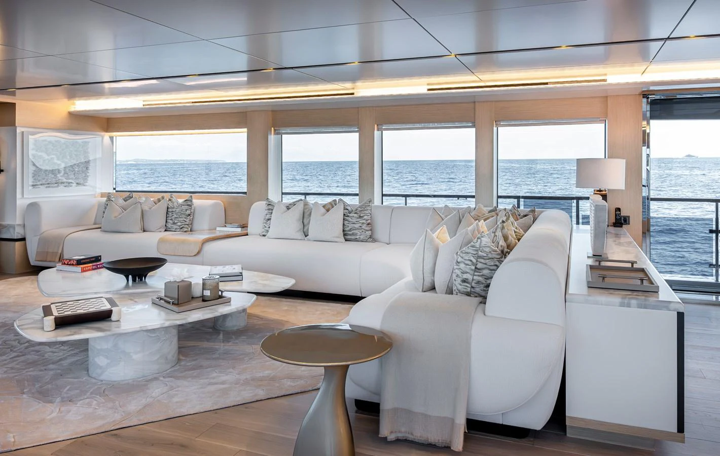 The salon features luxurious seating with panoramic ocean views. aboard NUMARINE 37XP#22 Yacht for Sale