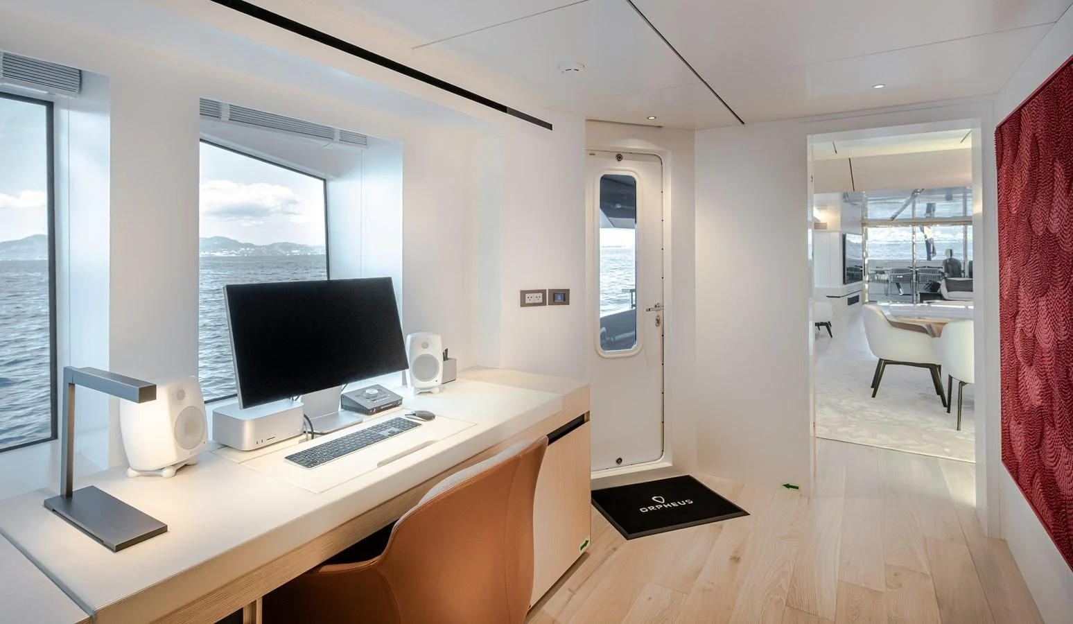 A sleek and modern office space with a stunning ocean view, perfect for working in tranquility. aboard NUMARINE 37XP#22 Yacht for Sale