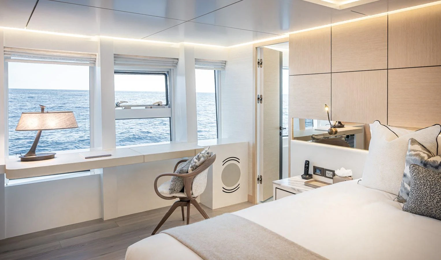 The stateroom offers a serene and luxurious retreat with ocean views and elegant furnishings. aboard NUMARINE 37XP#22 Yacht for Sale