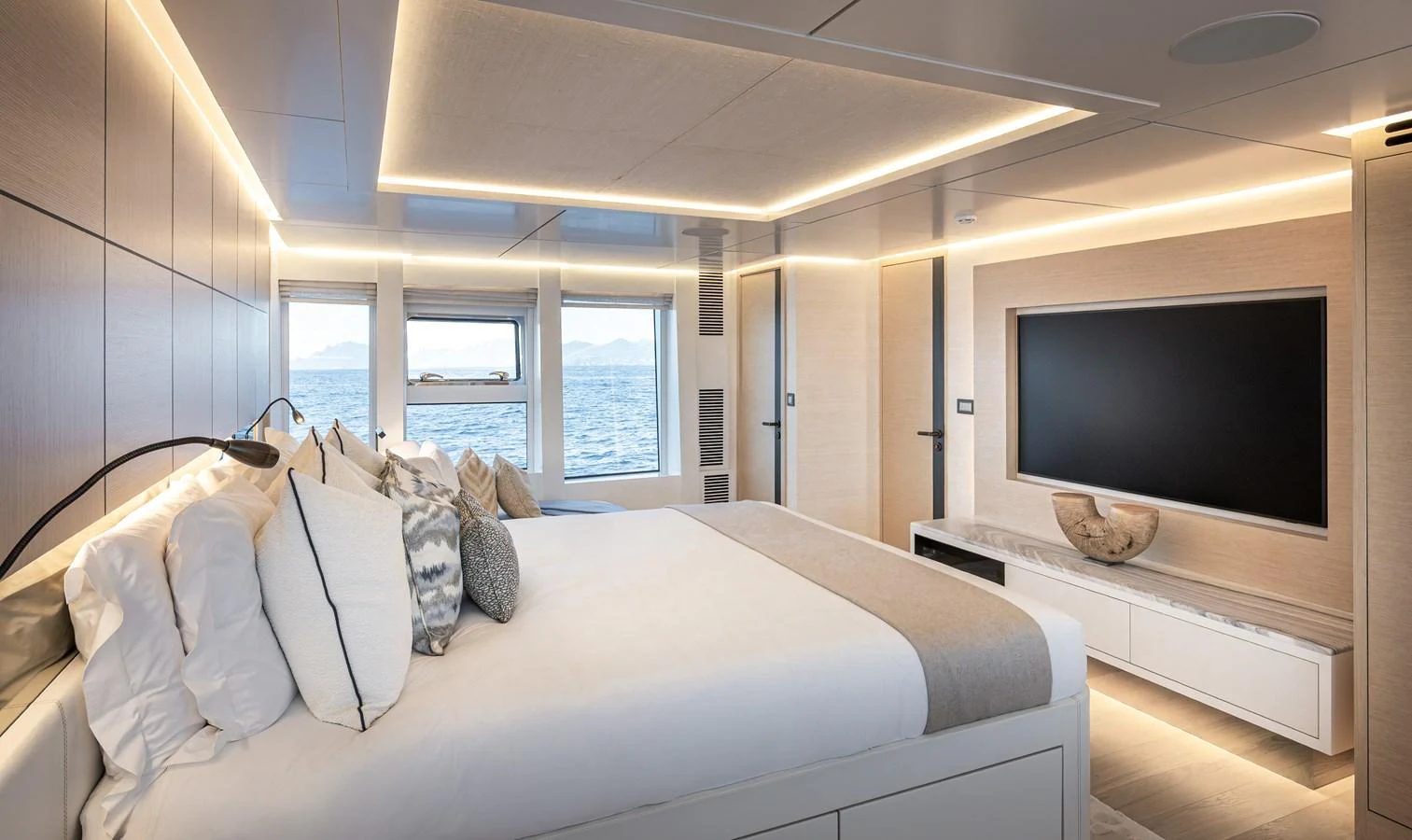 The master stateroom offers a luxurious and serene retreat with modern design and ocean views. aboard NUMARINE 37XP#22 Yacht for Sale