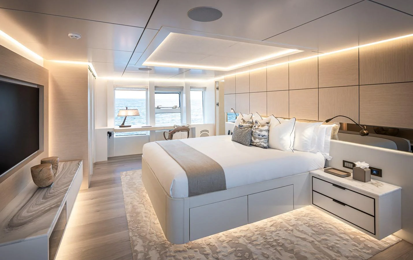 The master stateroom exudes luxury with its modern design and ambient lighting. aboard NUMARINE 37XP#22 Yacht for Sale
