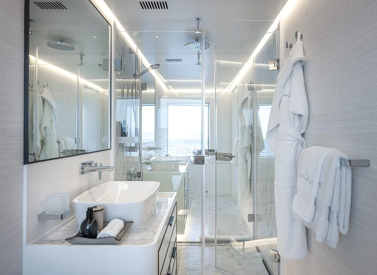 The yacht's bathroom features a sleek, modern design with luxurious amenities and ample natural light. aboard NUMARINE 37XP#22 Yacht for Sale
