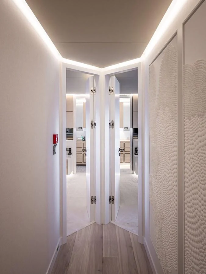 A stylish corridor leads to a modern and elegant interior space. aboard NUMARINE 37XP#22 Yacht for Sale