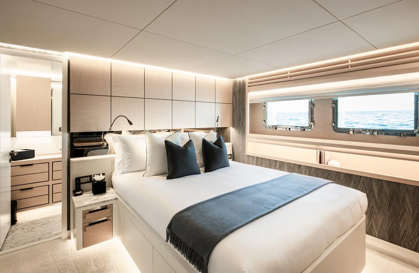 The master stateroom offers a serene and luxurious retreat with elegant decor and ample natural light. aboard NUMARINE 37XP#22 Yacht for Sale