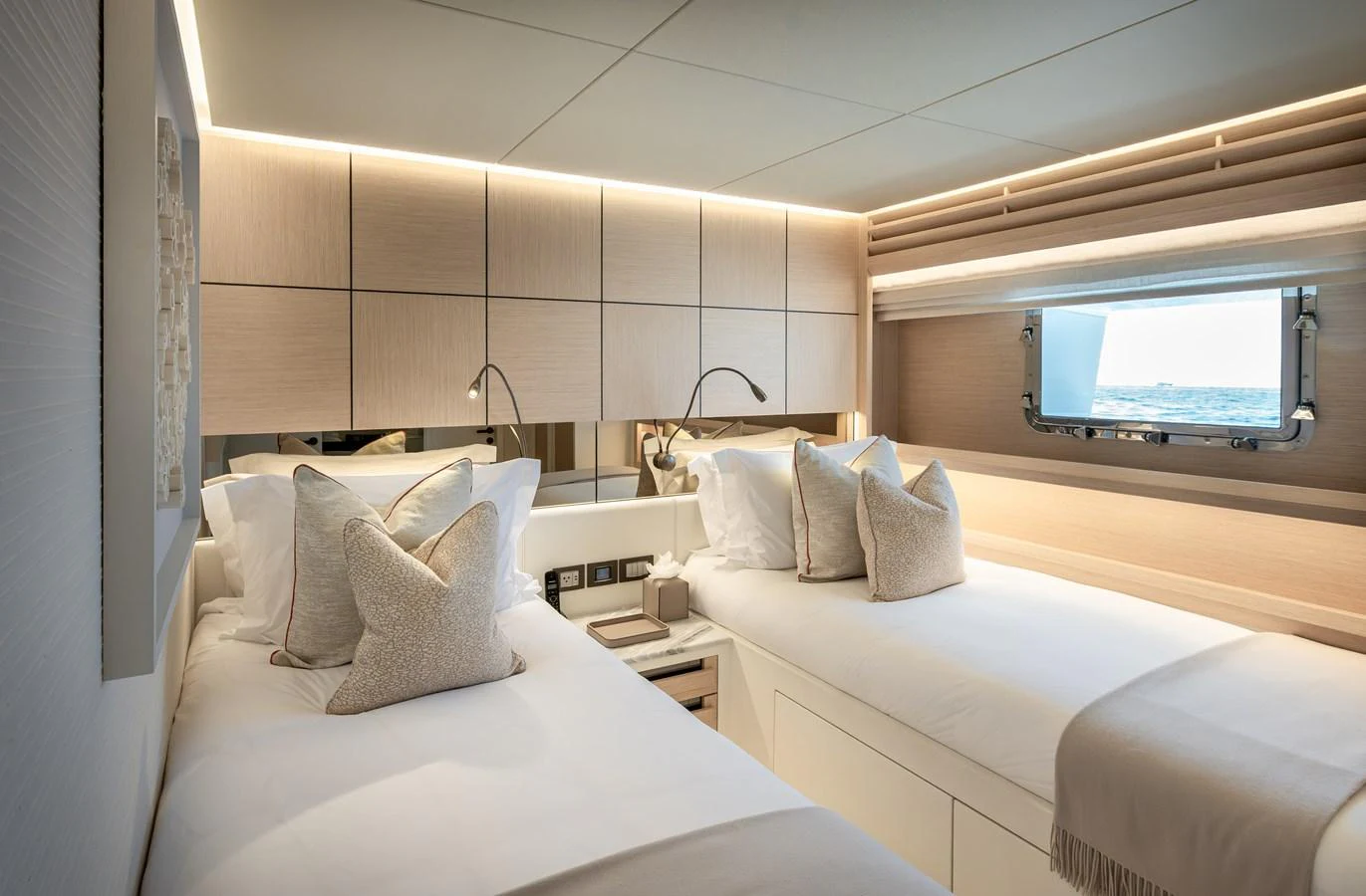 The twin stateroom offers a serene and comfortable retreat with modern furnishings and ample natural light. aboard NUMARINE 37XP#22 Yacht for Sale