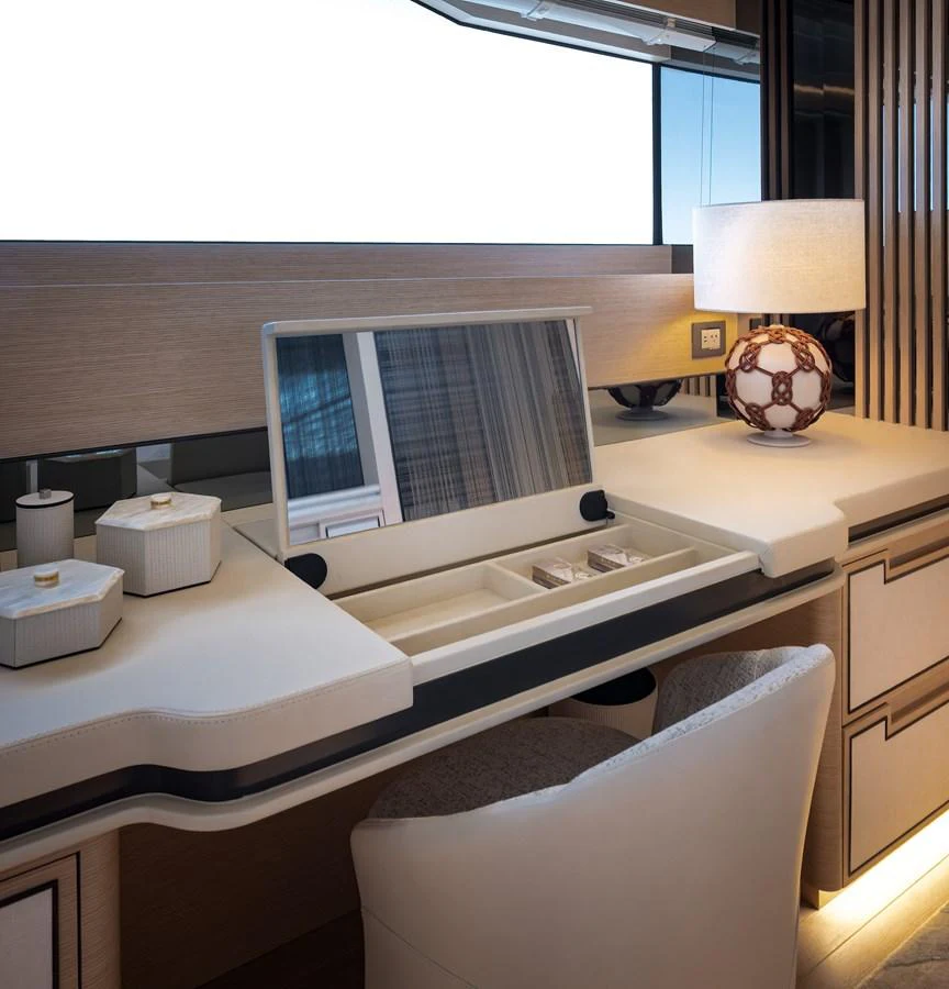 A sophisticated vanity area with elegant lighting and storage solutions. aboard NUMARINE 37XP#22 Yacht for Sale