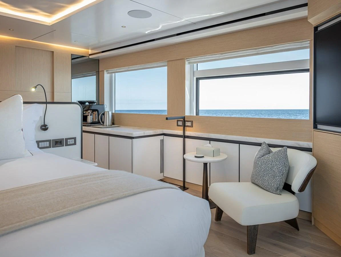A luxurious stateroom with a stunning ocean view and modern amenities. aboard NUMARINE 37XP#22 Yacht for Sale