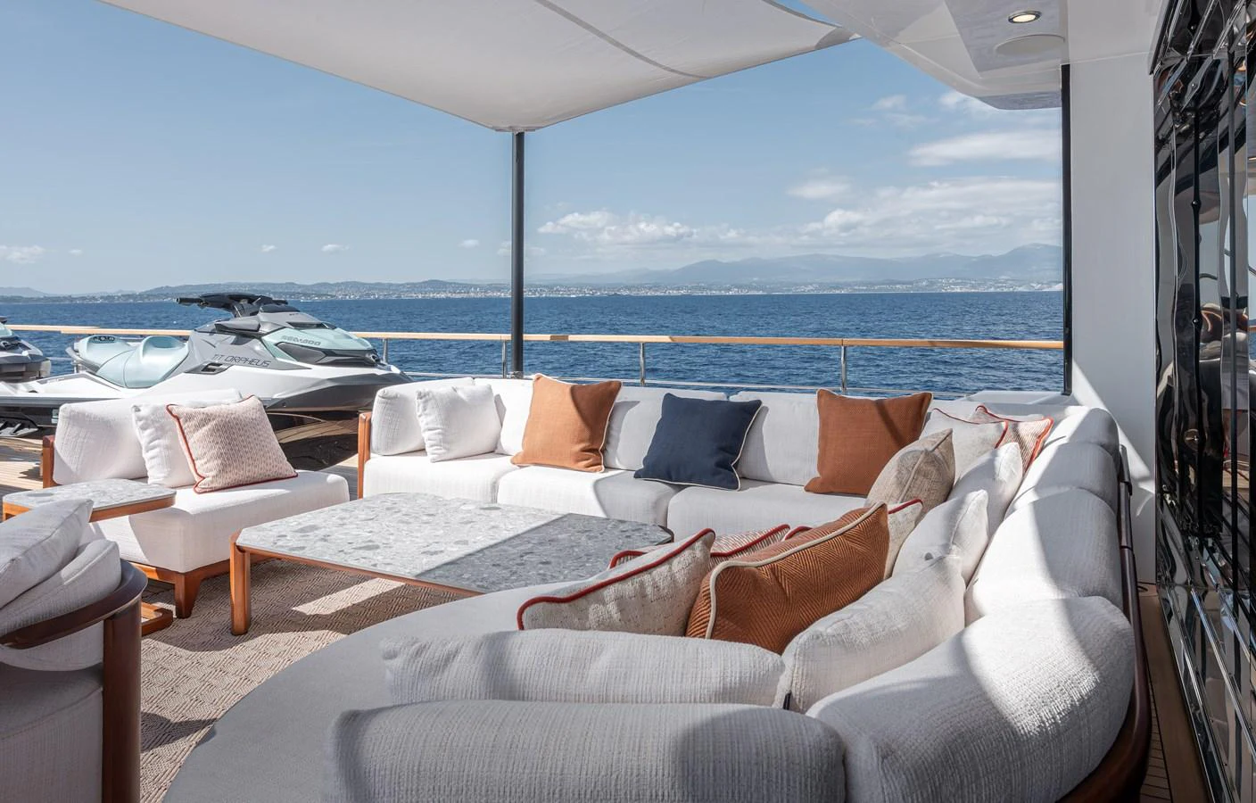 The aft deck features a comfortable seating area with stunning ocean views. aboard NUMARINE 37XP#22 Yacht for Sale