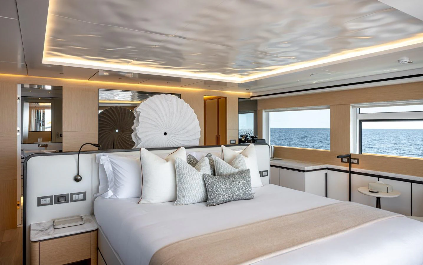 The master stateroom offers a luxurious and serene retreat with a stunning ocean view. aboard NUMARINE 37XP#22 Yacht for Sale