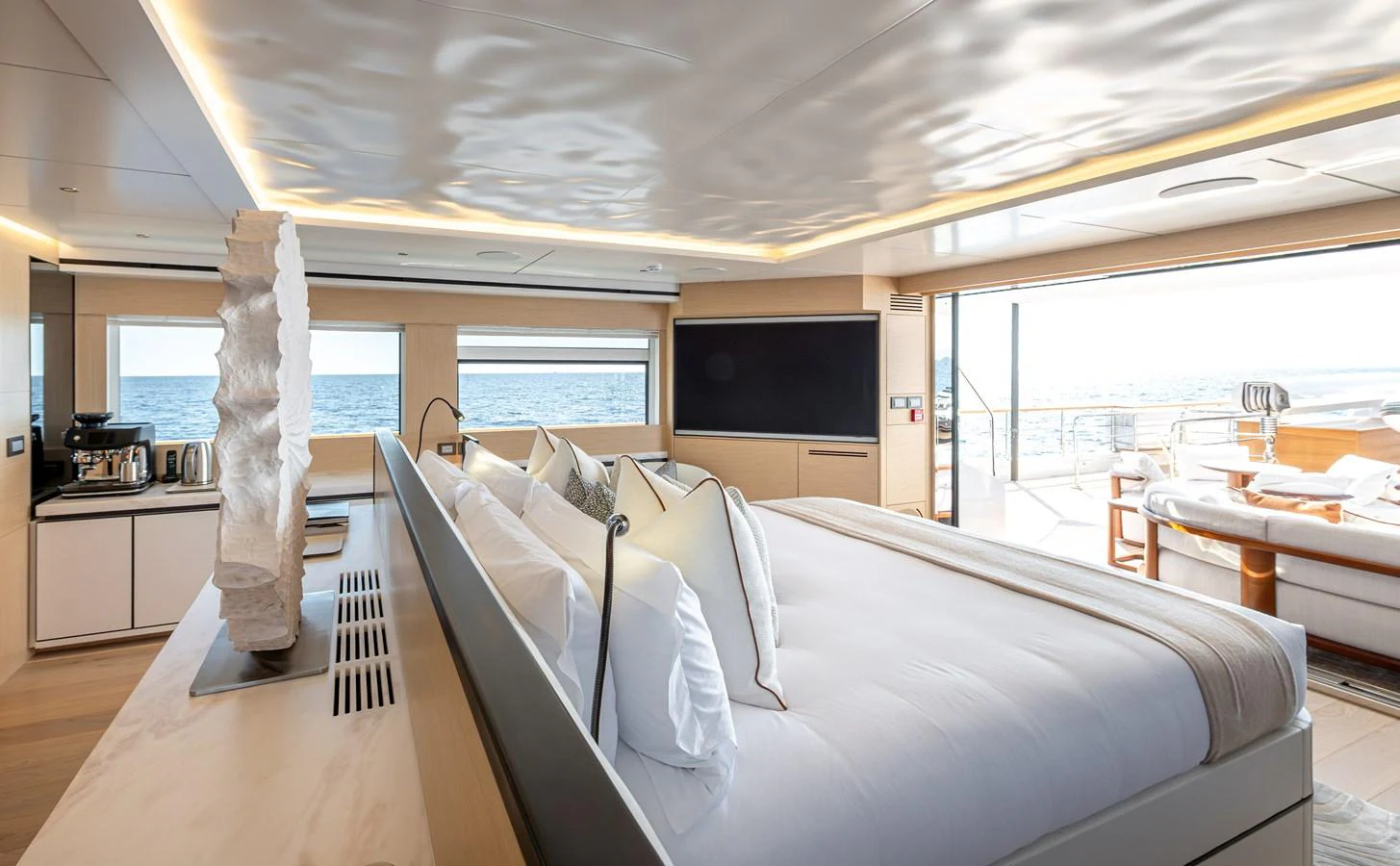 The master stateroom offers a luxurious and spacious retreat with stunning ocean views. aboard NUMARINE 37XP#22 Yacht for Sale
