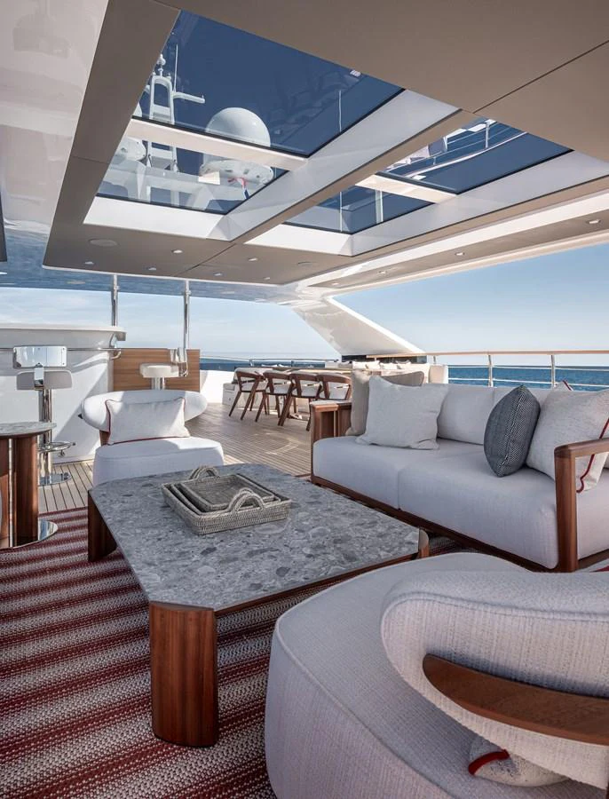 The aft deck offers a luxurious outdoor seating area with a stunning ocean view. aboard NUMARINE 37XP#22 Yacht for Sale