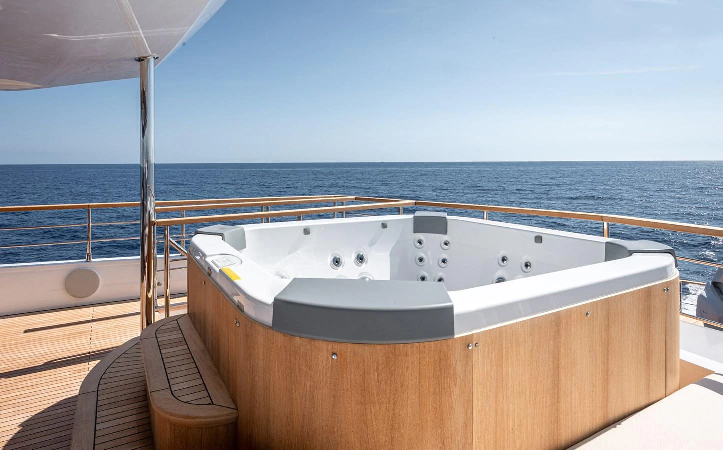 The sundeck features a luxurious hot tub with stunning ocean views. aboard NUMARINE 37XP#22 Yacht for Sale