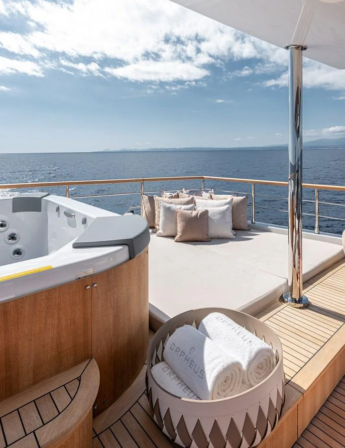 The sundeck features a luxurious hot tub and comfortable sun loungers with a stunning ocean view. aboard NUMARINE 37XP#22 Yacht for Sale