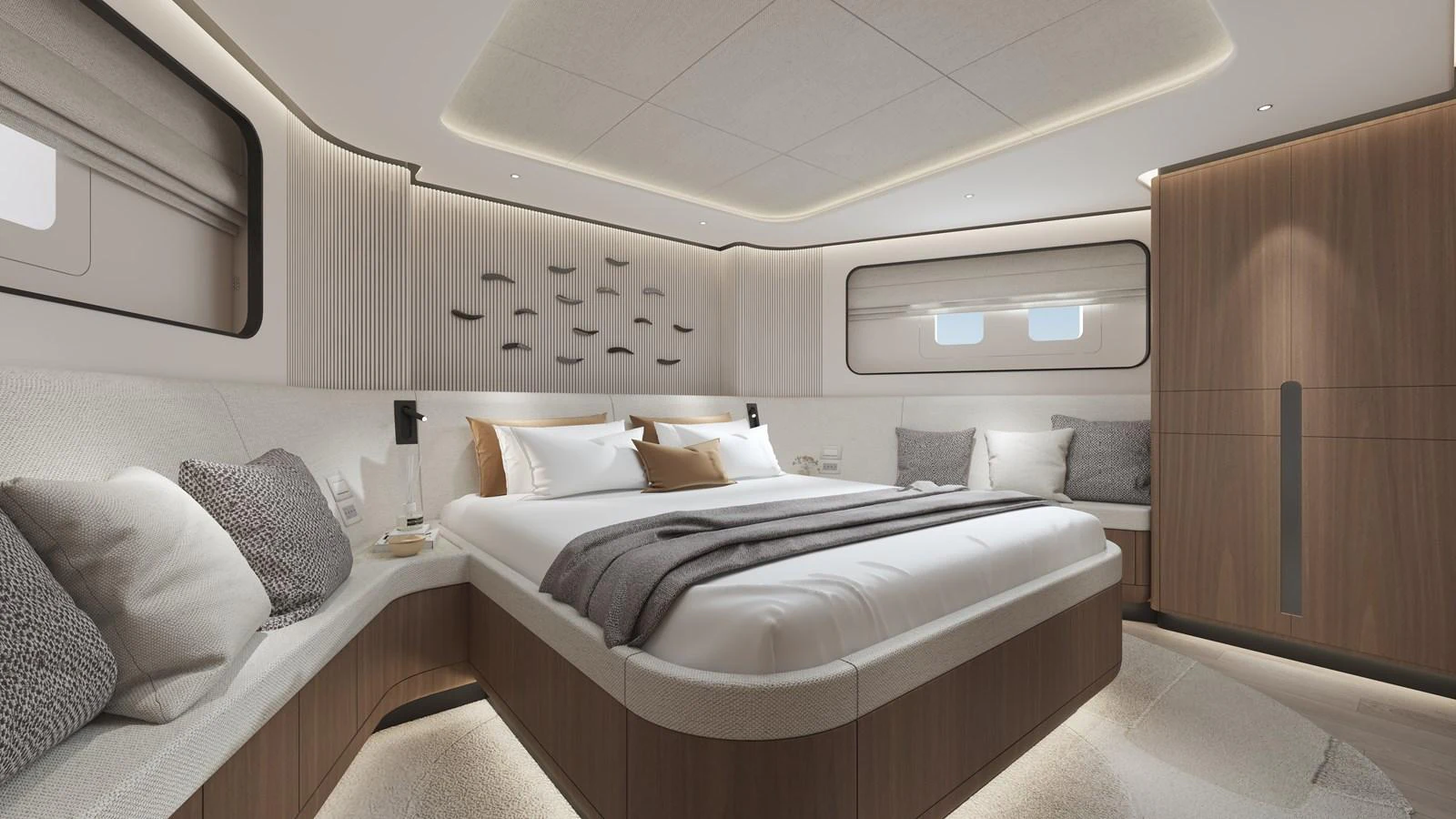 The stateroom features a luxurious bed with elegant lighting and modern decor. aboard B77 Yacht for Sale