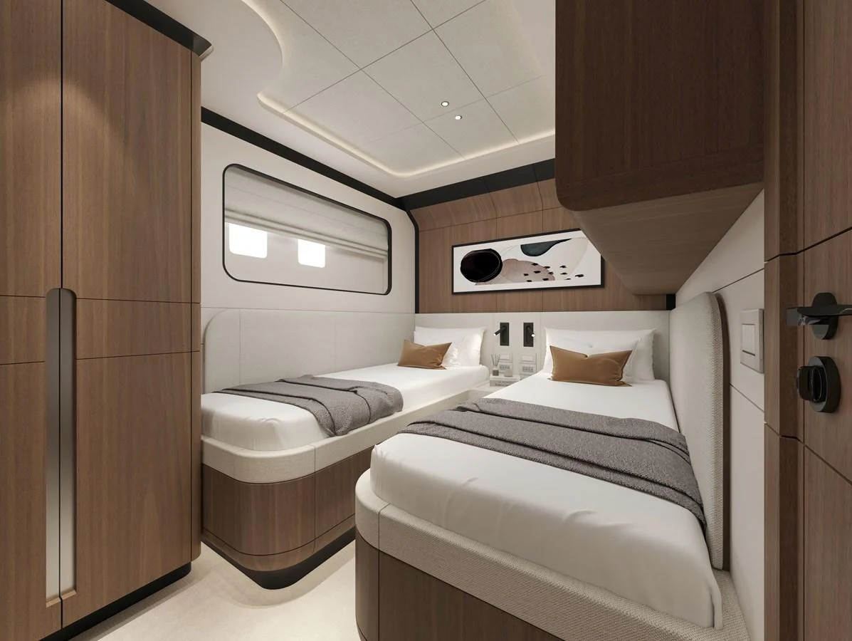 The guest stateroom features twin beds with modern wood paneling and elegant decor. aboard B77 Yacht for Sale