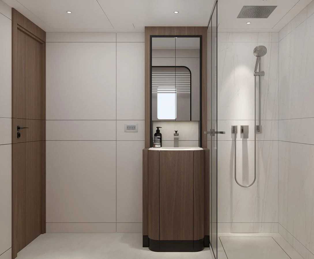 The yacht's bathroom features a sleek, modern design with a glass-enclosed shower and elegant fixtures. aboard B77 Yacht for Sale